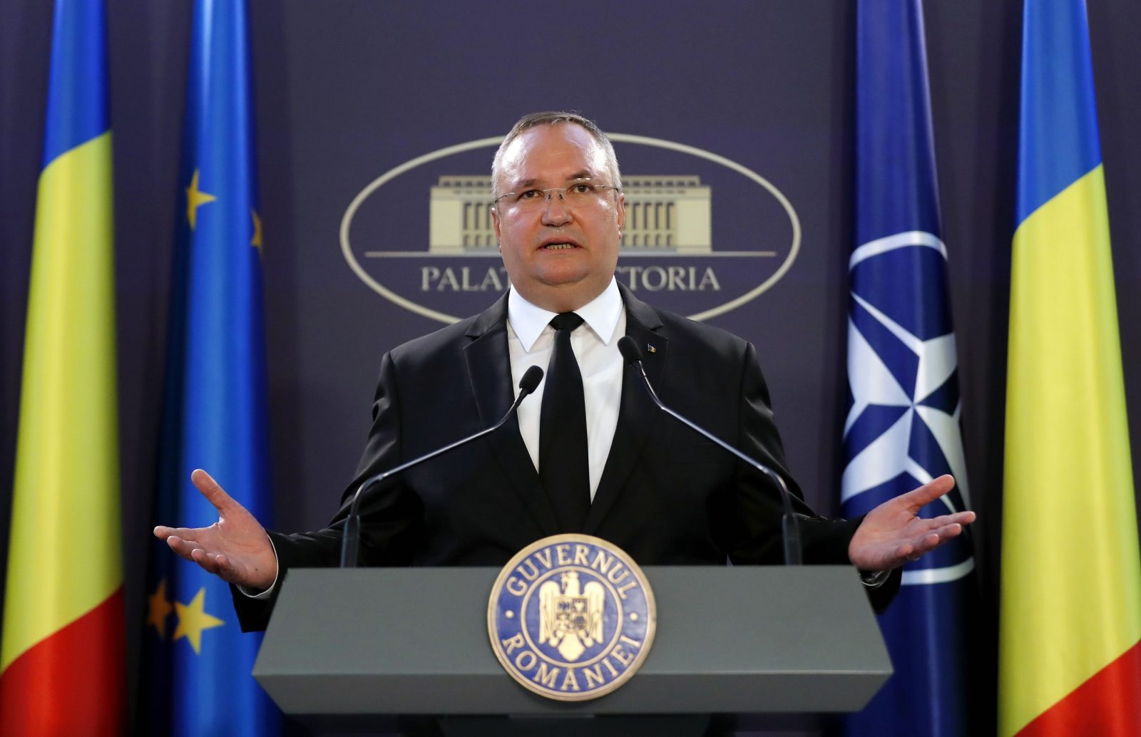 epaselect epa10686816 Romanian Prime Minister Nicoale Ciuca delivers his last speech during a press conference, shortly after he stepped-down for the prime minister switch inside the ruling coalition, at the government headquarters in Bucharest, Romania, 12 June 2023. Romania's Prime Minister Nicolae Ciuca decided to resign on 12 June to open the door for the 'rotation' of the ruling parties. The new prime minister, most probably PSD leader Marcel Ciolacu, now the president of the Senate chamber, would take over after being nominated as designated premier by Romania's President Klaus Iohannis, and his cabinet will pass a confidence vote in front of Parliament.  EPA/ROBERT GHEMENT