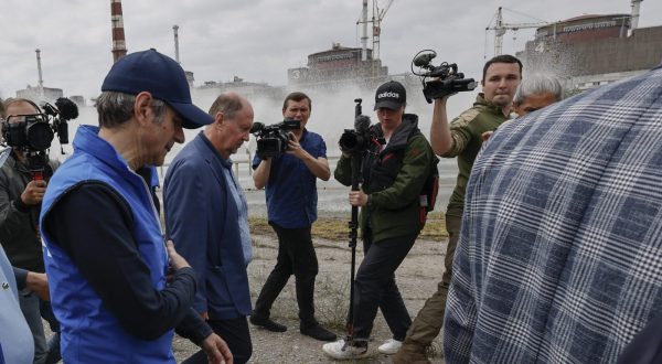 epa10692582 A picture taken during a visit to Enerhodar organised by the Russian Defence ministry shows International Atomic Energy Agency (IAEA) Director-General Rafael Mariano Grossi (L) examines the Zaporizhzhia Nuclear Power Plant in Enerhodar, southeastern Ukraine, 15 June 2023. The Zaporizhzhia Nuclear Power Plant can still continue to draw water from the Kakhovka reservoir, the IAEA reports. Grossi said that after the destruction of the Kakhovka hydroelectric power station, a situation may arise when the water from the Kakhovka reservoir will not be enough to cool the reactors of the Zaporozhye nuclear power plant. According to him, in this case, the reactors can be damaged, which threatens with the onset of radiological consequences. The water level in the reservoir near the Zaporizhzhya TPP has dropped to 11.27 meters and continues to decline.  EPA/SERGEI ILNITSKY