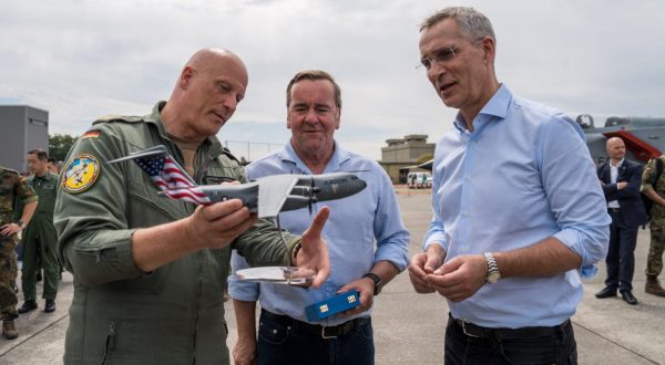 epa10701432 NATO Secretary General Jens Stoltenberg (R) receives a scale model of an Airbus A400M military cargo plane from Chief of Staff of the German Air Force Lieutenant General Ingo Gerhartz (L), standing next to German Defense Minister Boris Pistorius (C), during his visit of the NATO Air Defender 2023 exercise, in Jagel, Germany, 20 June 2023. The 'Air Defender 2023' maneuver is the largest North Atlantic Treaty Organization (NATO) redeployment exercise of air forces in its existence and takes place from 12 to 23 June gathering up to 10,000 participants from 25 nations with 250 aircraft to train air operations in European airspace under the command of the German Air Force, the German Armed Forces (Bundeswehr) explains on their website.  EPA/MARTIN ZIEMER / POOL