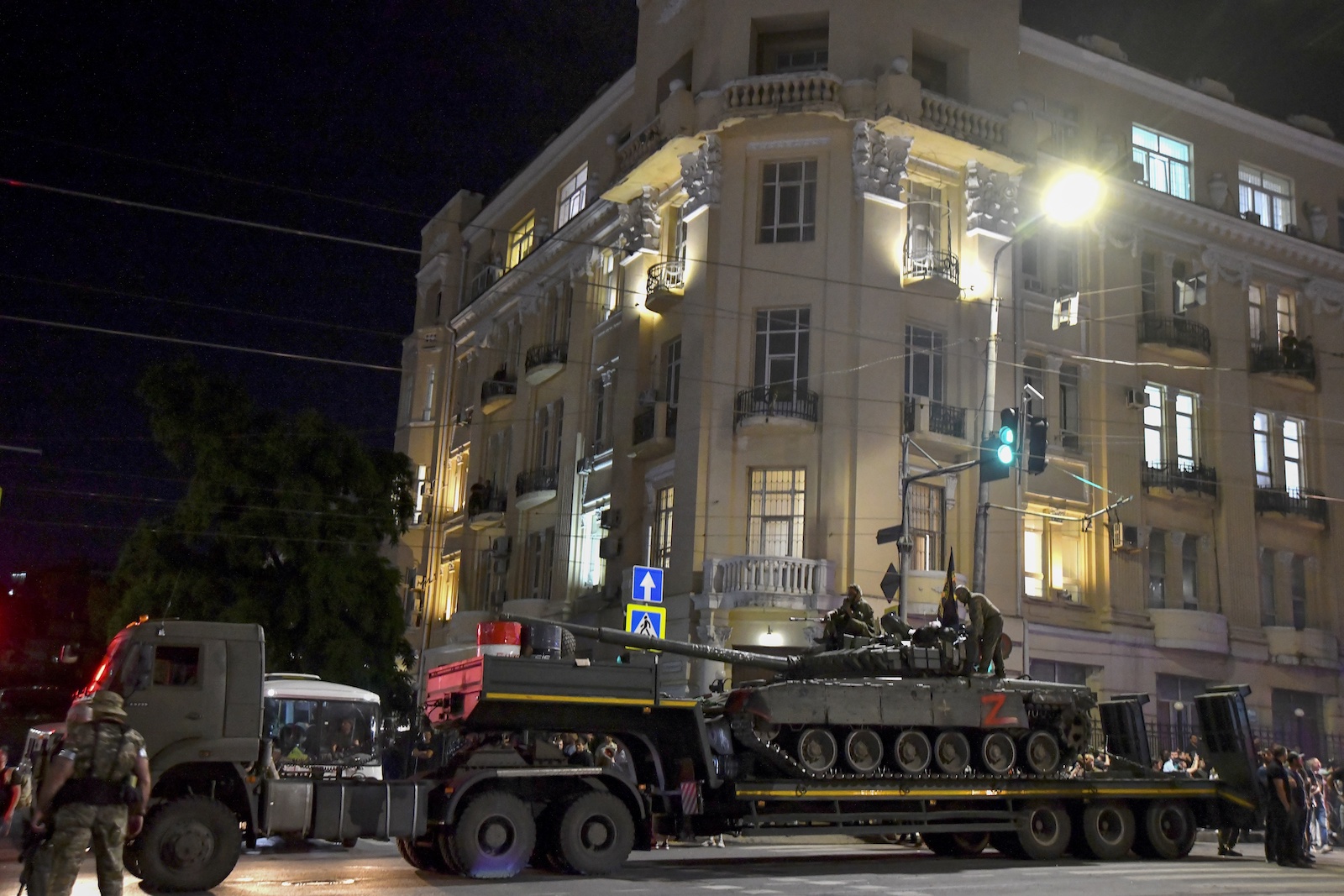 epa10710226 Private military company (PMC) Wagner Group servicemen prepare to leave downtown Rostov-on-Don, southern Russia, 24 June 2023. Security and armoured vehicles were deployed after the Chief of the private military company (PMC) Wagner Group said in a video that his troops had occupied the building of the headquarters of the Southern Military District, demanding a meeting with Russia's defense chiefs. The President of Belarus held talks with the head of the Wagner group, as a result of which he accepted a proposal to stop the movement of the group's fighters across Russia, the press service of the President of Belarus reported. The Chief of Wagner Group has said that columns of his group will return to field camps.  EPA/ARKADY BUDNITSKY