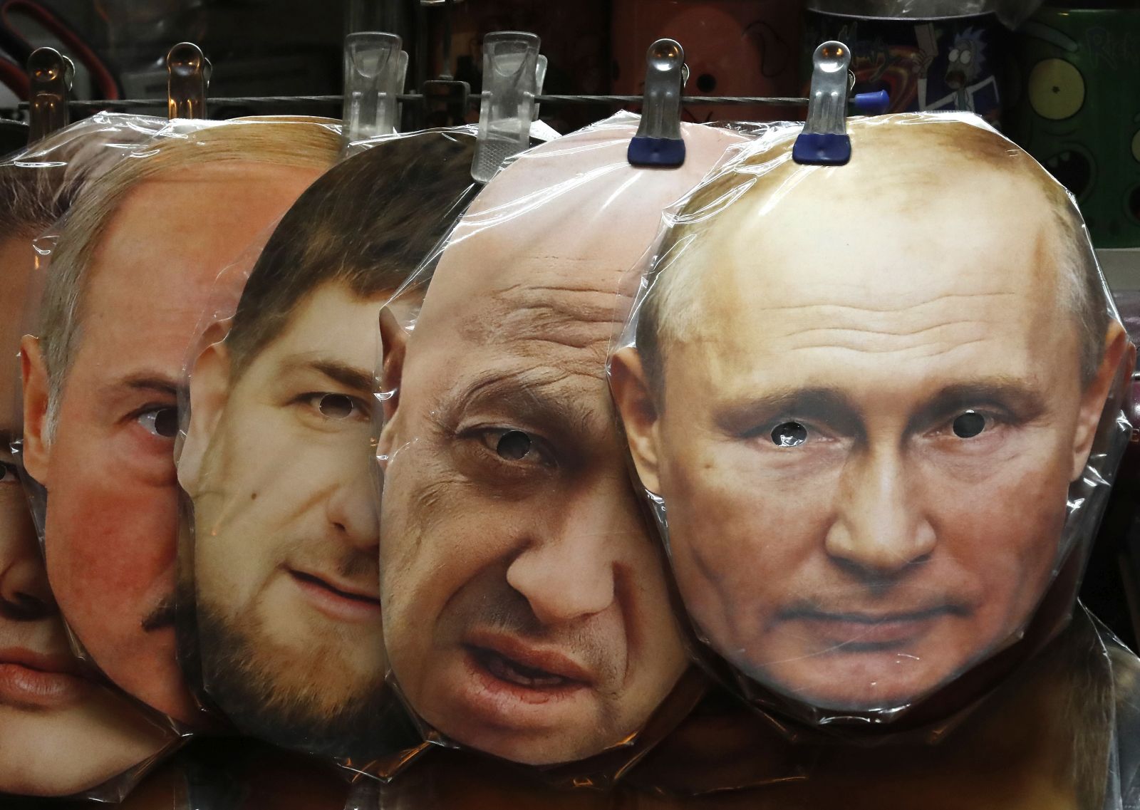 epa10674462 Face masks depicting (from-R) Russian President Vladimir Putin, owner of PMC (Private Military Company) Wagner Yeugeny Prigozhin, Chechen's regional leader Ramzan Kadyrov and Belarusian President Alexander Lukashenko are displayed for sale at a souvenir market in central St. Petersburg, Russia, 05 June 2023. On 24 February 2022 Russian troops entered the Ukrainian territory in what the Russian president declared a 'Special Military Operation', starting an armed conflict that has provoked destruction and a humanitarian crisis.  EPA/ANATOLY MALTSEV