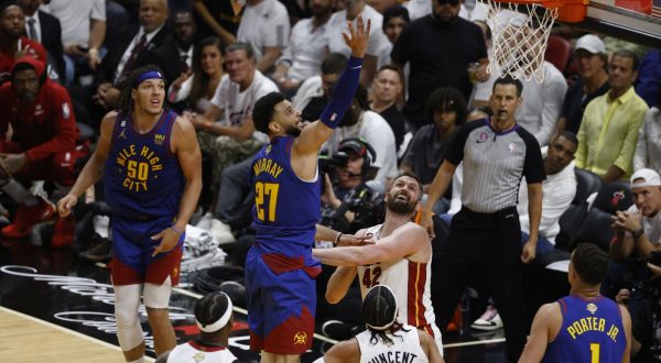 epa10678801 Denver Nuggets guard Jamal Murray (3-L) goes to the basket for two points over Miami Heat forward Kevin Love (3-R) during the second half of game three of the NBA Finals between the Denver Nuggets and Miami Heat at Kaseya Center in Miami, Florida, USA, 07 June 2023.  EPA/RHONA WISE SHUTTERSTOCK OUT