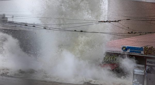 epaselect epa10679725 The explosion of a Russian artillery shell targeting an Amphibious ATV during flood evacuations in Kherson, Ukraine, 08 June 2023, amid the Russian invasion. Ukraine has accused Russian forces of destroying a critical dam and hydroelectric power plant on the Dnipro River in the Kherson region along the front line in southern Ukraine on 06 June, leading to the flooding of a number of settlements.  EPA/STAS KOZLIUK