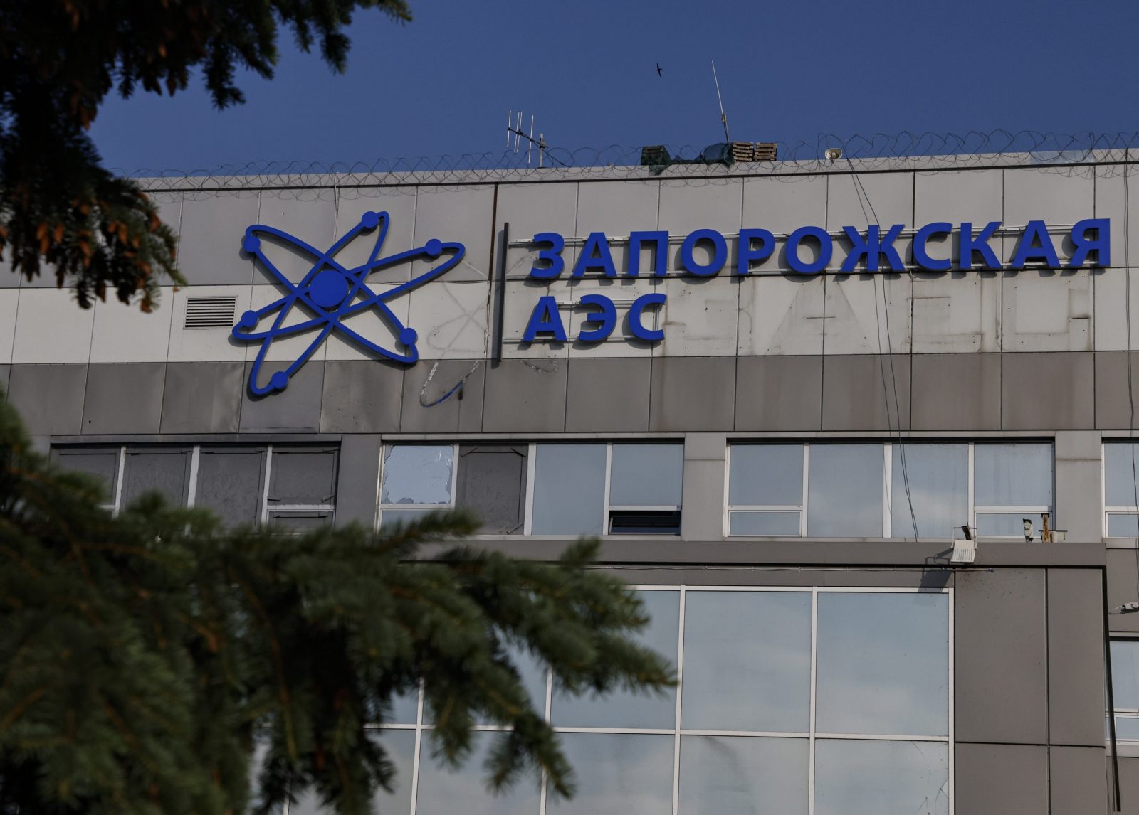 epa10692547 A picture taken during a visit to Enerhodar organised by the Russian Defence ministry shows a general view of the administrative building of the Zaporizhzhia Nuclear Power Plant in Enerhodar, southeastern Ukraine, 15 June 2023. The Zaporizhzhia Nuclear Power Plant can still continue to draw water from the Kakhovka reservoir, the IAEA reports. Grossi said that after the destruction of the Kakhovka hydroelectric power station, a situation may arise when the water from the Kakhovka reservoir will not be enough to cool the reactors of the Zaporozhye nuclear power plant. According to him, in this case, the reactors can be damaged, which threatens with the onset of radiological consequences. The water level in the reservoir near the Zaporizhzhya TPP has dropped to 11.27 meters and continues to decline.  EPA/SERGEI ILNITSKY