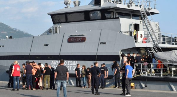 epa10704616 Migrants disembark a Coast Guard vessel as they arrive to port in Kalamata, Peloponnese, Greece, 21 June 2023. The vessel transported 63 migrants, who were found on a sailboat 27 nautical miles southwest of Tainaros, Greece. The rescued people, who say they are mainly citizens of Iraq, Iran, Syria and Morocco, have been transferred to the warehouses where they will remain until the migration proceedings are completed.  EPA/NIKITAS KOTSIARIS
