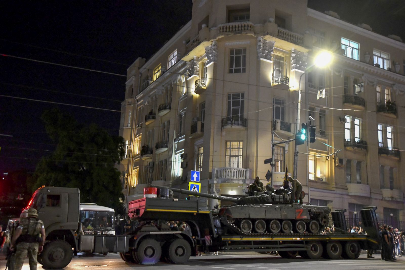epa10710226 Private military company (PMC) Wagner Group servicemen prepare to leave downtown Rostov-on-Don, southern Russia, 24 June 2023. Security and armoured vehicles were deployed after the Chief of the private military company (PMC) Wagner Group said in a video that his troops had occupied the building of the headquarters of the Southern Military District, demanding a meeting with Russia's defense chiefs. The President of Belarus held talks with the head of the Wagner group, as a result of which he accepted a proposal to stop the movement of the group's fighters across Russia, the press service of the President of Belarus reported. The Chief of Wagner Group has said that columns of his group will return to field camps.  EPA/ARKADY BUDNITSKY