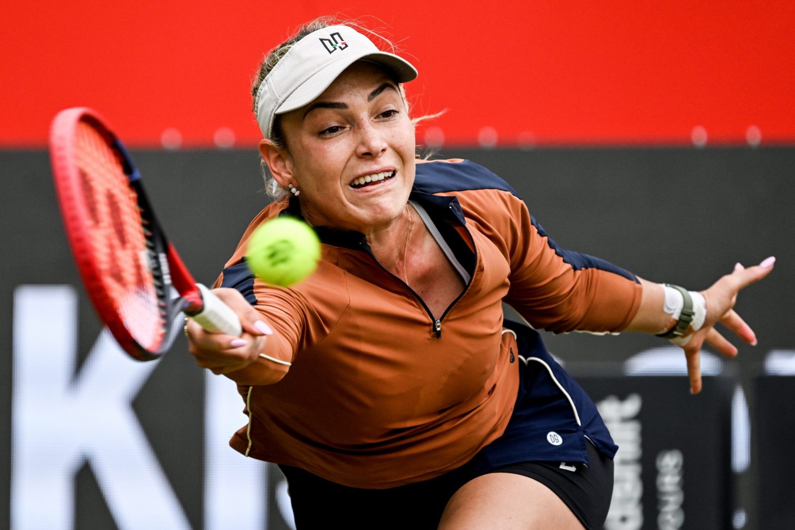 epa10710790 Donna Vekic of Croatia in action against Petra Kvitova of Czech Republic during their final match at the WTA German Open tennis tournament in Berlin, Germany, 25 June 2023.  EPA/FILIP SINGER