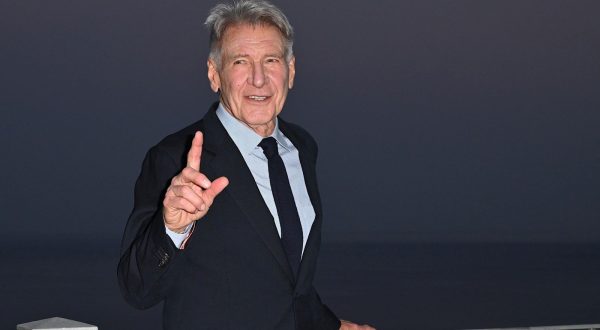 epa10711279 US actor Harrison Ford poses during a photo call for the movie 'Indiana Jones and the Dial of Destiny' during the 69th annual Taormina Film Festival, Sicily Island, Italy, 25 June 2023.  EPA/CARMELO IMBESI