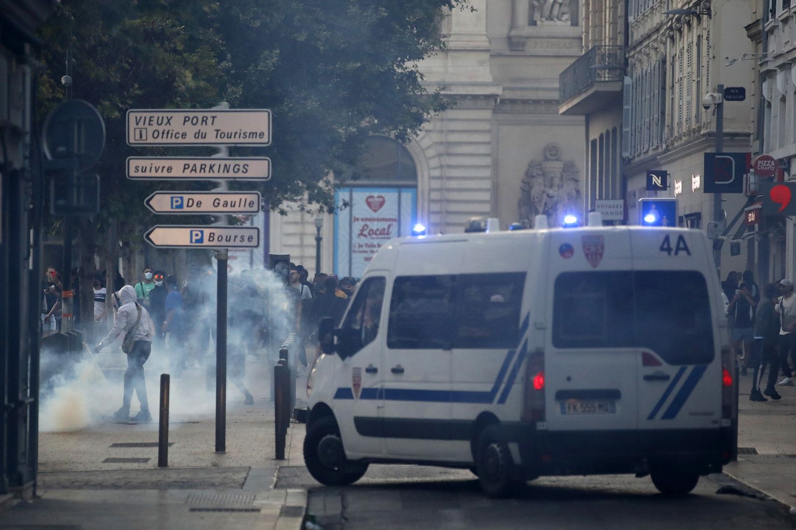 epa10719809 People clash with riot police during a  demonstration in memory of 17-year-old Nahel who was killed by French Police in Marseille, France, 30 June 2023. 
Violence broke out all over France after police fatally shot a 17-year-old teenager during a traffic stop in Nanterre on 27 June.  EPA/Sebastien Nogier