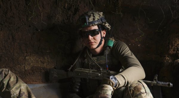 epa10722112 A Ukrainian serviceman nicknamed 'Tikhiy', a member of the 3rd Separate Assault Brigade, takes cover in a trench less than a kilometer away from the active frontline near Bakhmut, Donetsk region, eastern Ukraine, 01 July 2023 (issued 02 July 2023), amid the Russian invasion. The frontline city of Bakhmut, a key target for Russian forces, has seen heavy fighting for months. Russian troops entered Ukrainian territory in February 2022, starting a conflict that has provoked destruction and a humanitarian crisis.  EPA/ALEX BABENKO