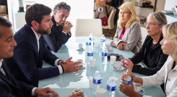 epa10722201 French Prime Minister Elisabeth Borne (2-R), Interior Minister Gerald Darmanin (L), Secretary of State for Rurality Dominique Faure (3-R) and Minister for Ecological Transition and Territories' Cohesion Christophe Bechu (3-R) meet with Vincent Jeanbrun (2-L), the Mayor of L'Hay-les-Roses, after rioters rammed a vehicle into his house overnight, at the City Hall in L'Hay-les-Roses, south of Paris, France, 02 July 2023. The attack, which injured the Mayor's wife and one of his children, occured in a fifth night of rioting sparked by the police killing of a 17-year-old, as police deployed reinforcements to flashpoint cities around the country. The Prime Minister called the attack 'intolerable', while prosecutors said they were treating it as attempted murder.  EPA/CHARLY TRIBALLEAU / POOL  MAXPPP OUT