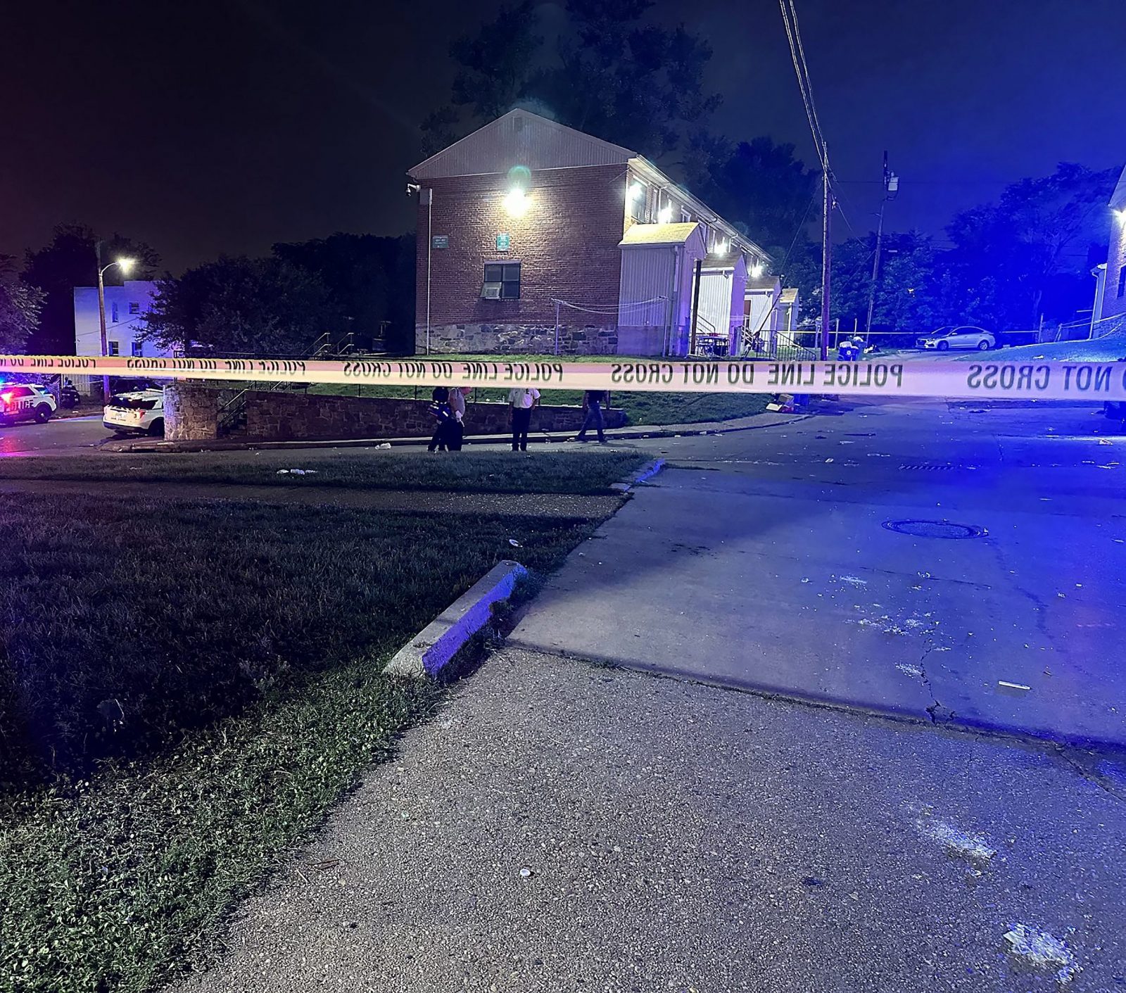 epa10722334 A handout photo made available by the Baltimore Police Department shows the aftermath of a shooting at a block party shortly after midnight local time in Baltimore, Maryland, USA, 02 July 2023. One person was killed at the scene and a second died later at the hospital, 20 of the 28 additional injured persons walked or drove themselves to area hospitals according to the Baltimore Police Department.  EPA/BALTIMORE POLICE DEPARTMENT HANDOUT  HANDOUT EDITORIAL USE ONLY/NO SALES