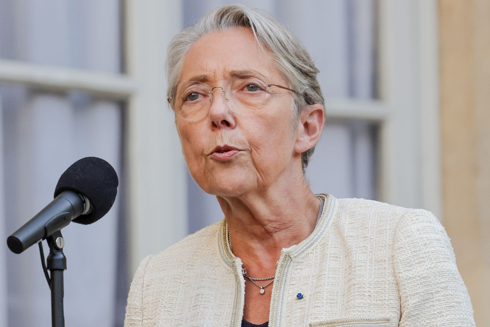 epa10724646 French Prime Minister Elisabeth Borne speaks to the media after holding a meeting with presidents of the parliamentary groups, following days of unrest, in Paris, France, 03 July 2023. Violence broke out across France over the fatal shooting of a 17-year-old teenager by a police officer during a traffic stop in Nanterre on 27 June.  EPA/OLIVIER MATTHYS