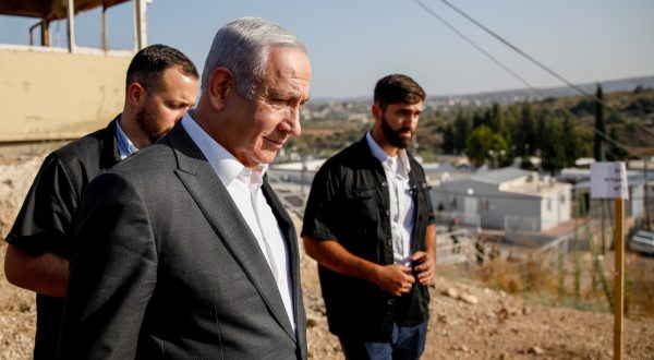 epa10726582 Israeli Prime Minister Benjamin Netanyahu arrives for a briefing near the Salem military post between Israel and the West Bank, 04 July 2023. Netanyahu indicated a military operation in the nearby Jenin refugee camp, one of the most intense in the territory in nearly two decades, was winding down, without gaving further details on when it would end and vowed to carry out similar operations in the future.  EPA/SHIR TOREM / POOL