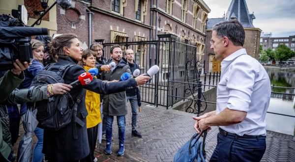 epa10728628 Dutch Prime Minister Mark Rutte arrives at the Ministry of General Affairs for a special cabinet meeting about the approach for asylum and migration in the Hague, the Netherlands, 05 July 2023. The government is under great pressure due to difficult negotiations on a migration package, in which the curtailment of the influx of asylum seekers in particular is leading to major tensions between the four coalition parties.  EPA/ROBIN UTRECHT