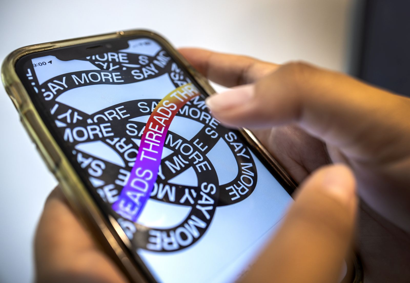 epa10729850 A person using a mobile phone logs in to the new Threads app in Miami, Florida, USA, 06 July 2023. Meta, the company behind Facebook and Instagram, said in a press release on 05 July 2023, that Mark Zuckerberg announced the initial version of 'Threads', an Instagram's text-based conversation app.  EPA/CRISTOBAL HERRERA-ULASHKEVICH
