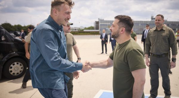 epa10734584 A handout picture made available by the Presidential Press Service shows Ukrainian President Volodymyr Zelensky (R) welcoming defence commanders of 'Azovstal', who were in Turkey after liberation from Russian captivity, before their departure to Ukraine, in Istanbul, Turkey, 08 July 2023. The five commanders from Azovstal were exchanged for 55 Russian soldiers on 22 September 2022. Under the terms of the exchange from Russia, commander of Azov Denys Prokopenko 'Redis', deputy commander of Azov Svyatoslav Palamar 'Kalyna', senior officer of 'Azov' Oleh Khomenko, commander of the 36th Separate Brigade of Marines Serhiy Volynsky 'Volyna' and commander of the 12th Brigade of National Guard Denys Shleha were to be in Turkey under the personal protection of President Recep Tayyip Erdogan until the end of the war.  EPA/PRESIDENTIAL PRESS SERVICE HANDOUT HANDOUT  HANDOUT EDITORIAL USE ONLY/NO SALES