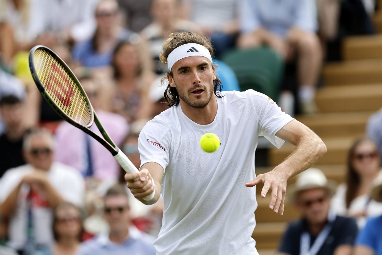 epa10734565 Stefanos Tsitsipas of Greece in action against Laslo Djere of Serbia during their Men's Singles third round match at the Wimbledon Championships, Wimbledon, Britain, 08 July 2023.  EPA/TOLGA AKMEN   EDITORIAL USE ONLY