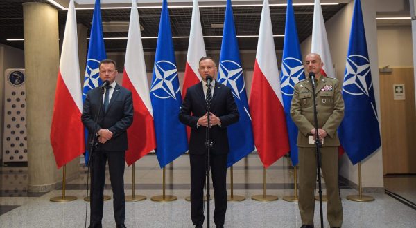 epa10737678 President Andrzej Duda (C), Minister of National Defense Mariusz Blaszczak (L) and Chief of the General Staff of the Polish Army Gen. Rajmund Andrzejczak (R) speak during the annual briefing of executives of the Ministry of National Defense and the Polish Armed Forces on the eve of the NATO summit in Vilnius, at the Cyberspace Defense Forces Component Command in Legionowo, Poland, 10 July 2023.  EPA/Marcin Obara POLAND OUT