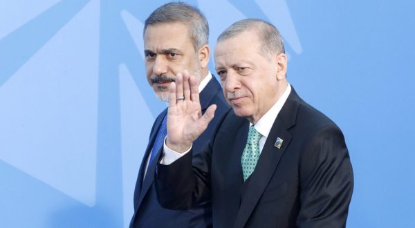 epa10740857 Turkey's President Recep Tayyip Erdogan (R) arrives for a second day of the NATO ​summit in Vilnius, Lithuania, 12 July 2023. The North Atlantic Treaty Organization (NATO) Summit takes place in Vilnius on 11 and 12 July 2023 with the alliance's leaders expected to adopt new defense plans.  EPA/TOMS KALNINS