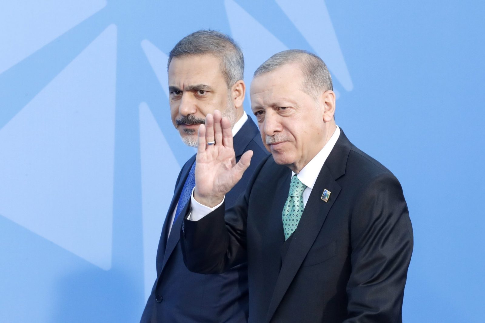epa10740857 Turkey's President Recep Tayyip Erdogan (R) arrives for a second day of the NATO ​summit in Vilnius, Lithuania, 12 July 2023. The North Atlantic Treaty Organization (NATO) Summit takes place in Vilnius on 11 and 12 July 2023 with the alliance's leaders expected to adopt new defense plans.  EPA/TOMS KALNINS