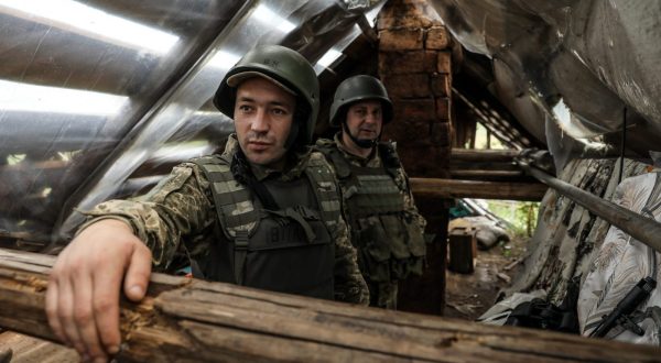 epa10746007 Ukrainian servicemen of the 24th Separate Mechanized Brigade named after 'King Danylo' at a position in the Donetsk region, eastern Ukraine, 14 July 2023, amid the Russian invasion. Russian troops entered Ukraine on 24 February 2022 starting a conflict that has provoked destruction and a humanitarian crisis.  EPA/OLEG PETRASYUK