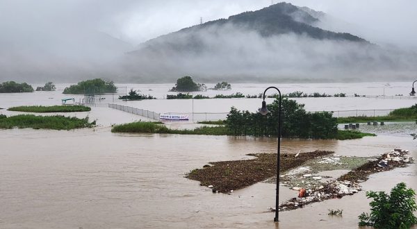 epa10747022 A baseball park is submerged by torrential rain in the central city of Sejong, South Korea 15 July 2023.  EPA/YONHAP SOUTH KOREA OUT