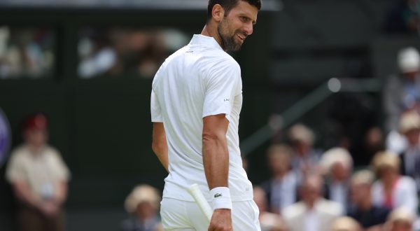 epa10749643 Novak Djokovic of Serbia reacts during the Men's Singles final match against Carlos Alcaraz of Spain at the Wimbledon Championships, Wimbledon, Britain, 16 July 2023.  EPA/NEIL HALL   EDITORIAL USE ONLY