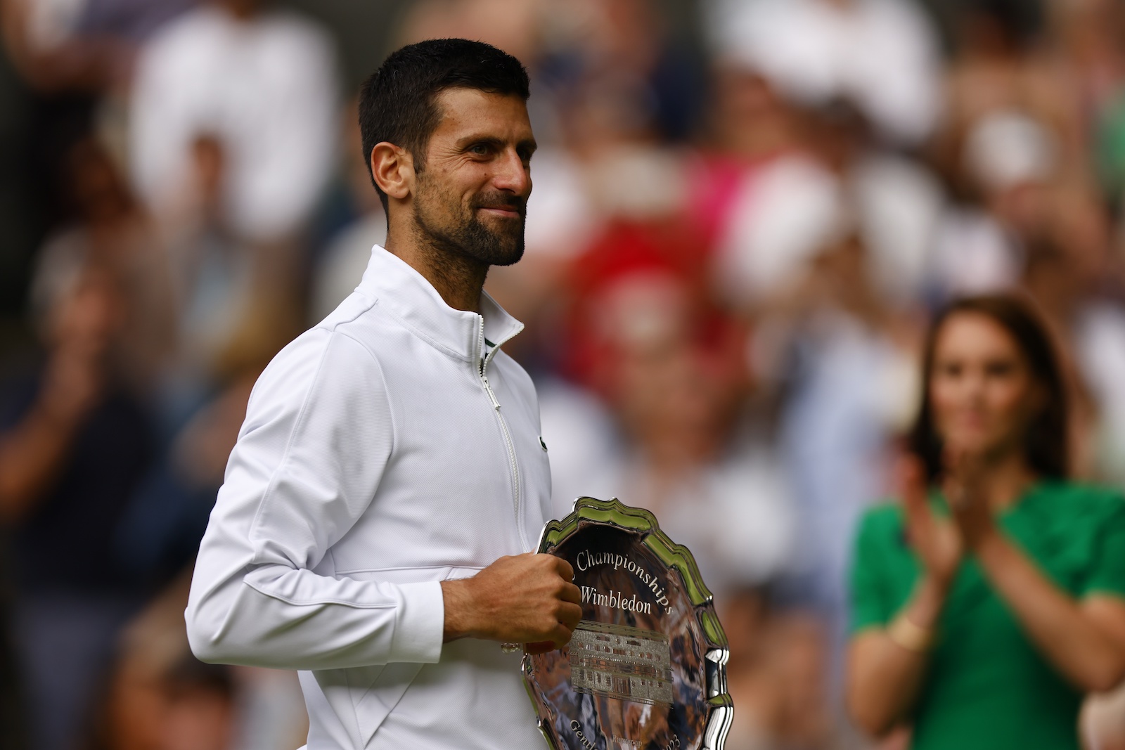 epa10750313 Runner-up Novak Djokovic of Serbia poses with the trophy after losing his Men's Singles final match against Carlos Alcaraz of Spain at the Wimbledon Championships, Wimbledon, Britain, 16 July 2023.  EPA/TOLGA AKMEN   EDITORIAL USE ONLY  EDITORIAL USE ONLY