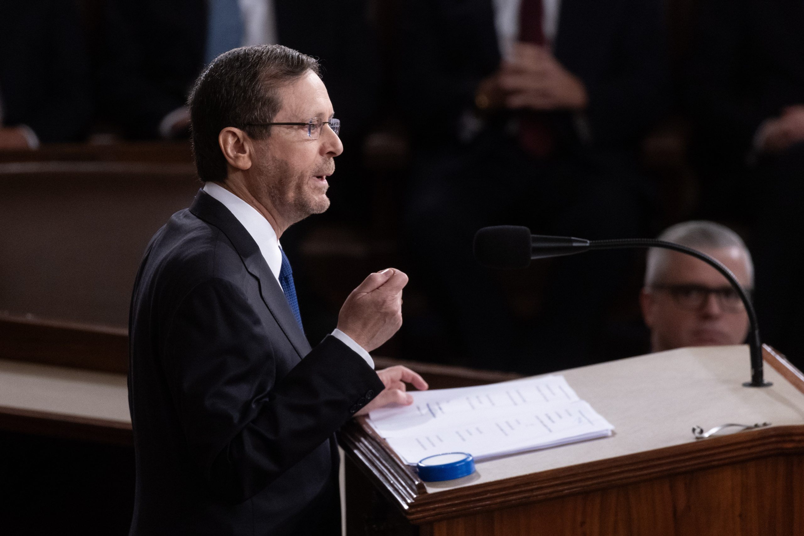 epa10756005 President of Israel Isaac Herzog delivers an address before a joint meeting of the US Congress on the floor of the House of Representatives in Washington, DC, USA, 19 July 2023. The address comes a day after Herzog met with US President Joe Biden to discuss relations between the two nations and reassure the United States of Israel's commitment to democracy.  EPA/MICHAEL REYNOLDS