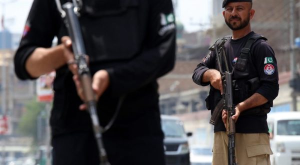 epa10758120 Pakistani security officials at a checkpoint, after security has been intensified following a suicide bomb attack at a security installation near the Afghan border in Khyber Agency, in Peshawar, Pakistan, 20 July 2023. A suicide bombing in Khyber has resulted in a death toll of four, with three police officers succumbing to their injuries. Eight other policemen were injured in the attack, which was carried out by two terrorists who entered a compound from both the main and rear gates, police said.  A rescue and search operation is currently underway, with the bomb disposal squad and CTD teams present at the crime scene. In a separate incident in the Regi area of Peshawar, two cops were killed and two others injured in a firing incident by unidentified armed men. These attacks come amidst a surge in terrorist activities in Pakistan, as indicated by a report from the Pakistan Institute for Conflict and Security Studies (PICSS), which shows a 79% increase in terror activities during the first half of 2023, following the Afghan Taliban's return to power.  EPA/ARSHAD ARBAB