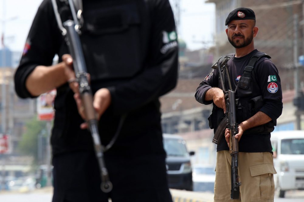 epa10758120 Pakistani security officials at a checkpoint, after security has been intensified following a suicide bomb attack at a security installation near the Afghan border in Khyber Agency, in Peshawar, Pakistan, 20 July 2023. A suicide bombing in Khyber has resulted in a death toll of four, with three police officers succumbing to their injuries. Eight other policemen were injured in the attack, which was carried out by two terrorists who entered a compound from both the main and rear gates, police said.  A rescue and search operation is currently underway, with the bomb disposal squad and CTD teams present at the crime scene. In a separate incident in the Regi area of Peshawar, two cops were killed and two others injured in a firing incident by unidentified armed men. These attacks come amidst a surge in terrorist activities in Pakistan, as indicated by a report from the Pakistan Institute for Conflict and Security Studies (PICSS), which shows a 79% increase in terror activities during the first half of 2023, following the Afghan Taliban's return to power.  EPA/ARSHAD ARBAB