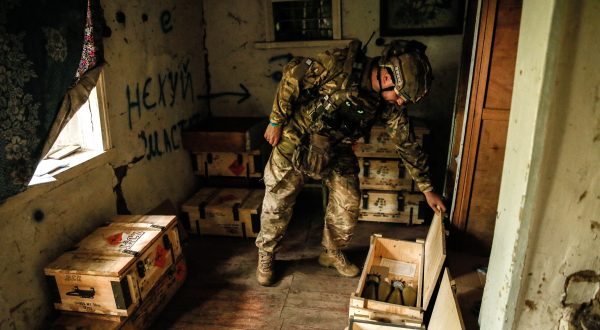 epa10758506 A Ukrainian serviceman of the 24 separate mechanized brigade named after King Danylo, opens the box with mortar shells at a military positions in the Donetsk region, Ukraine, 20 July 2023. The war in Ukraine, which started when Russia entered the country in February 2022, marked in July its 500th day. According to the UN, since the conflict started, more than 9000 civilians have been killed and more than 6 million others are now refugees worldwide.  EPA/OLEG PETRASYUK