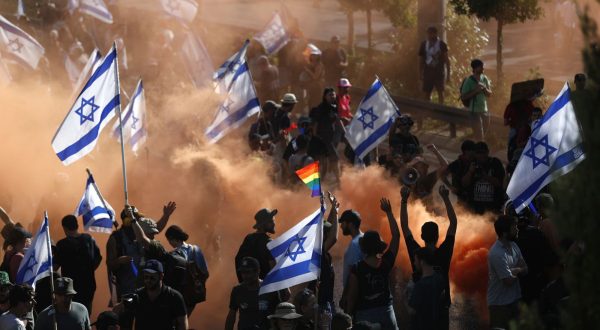 epa10766597 Anti-government demonstrators block the Highway 50, as protests continue across the country as the Israeli parliament, or Knesset, passed a bill that would limit the Supreme Court's powers, in Jerusalem, 24 July 2023.  EPA/ATEF SAFADI