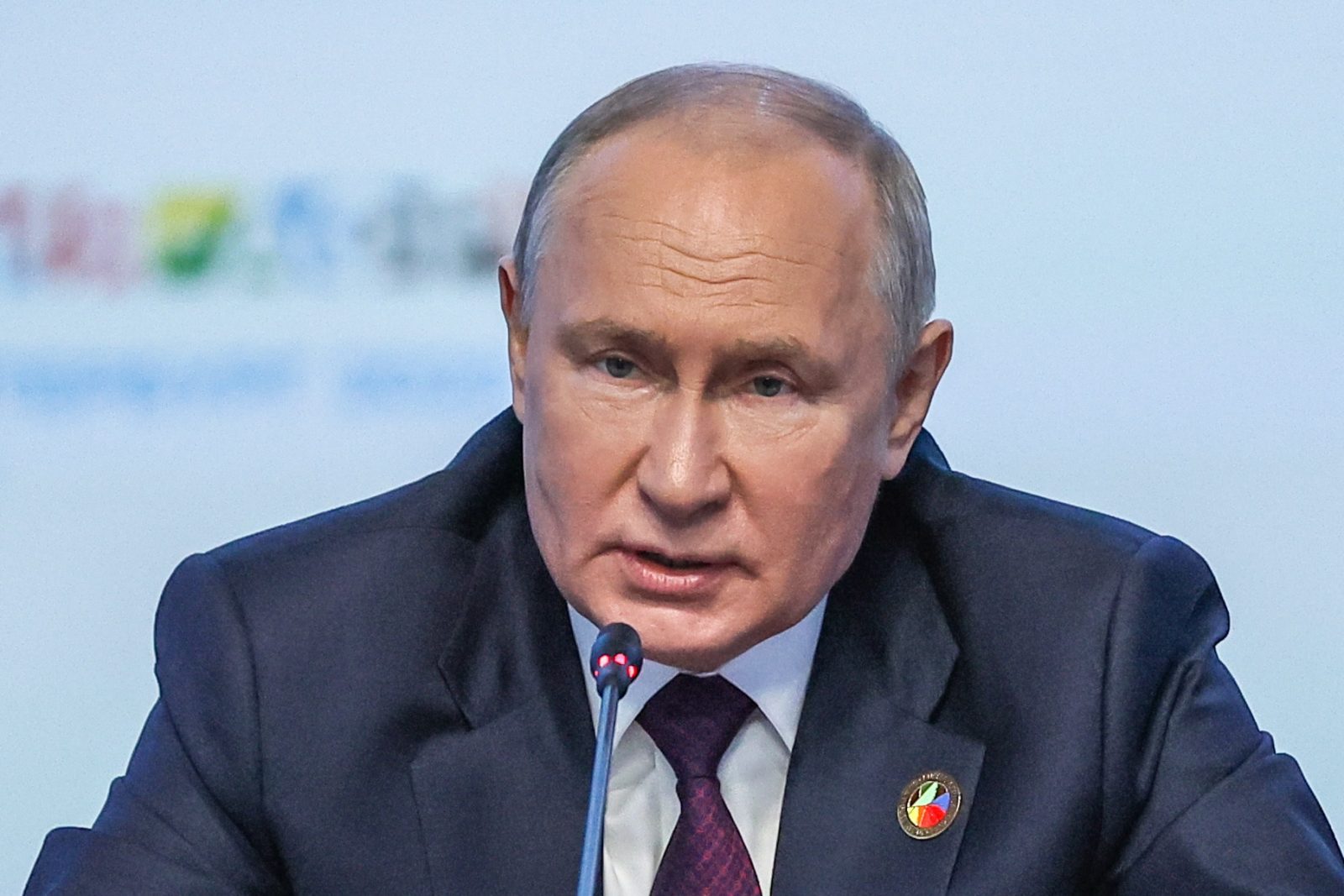 epa10772912 A handout photo made available by TASS Host Photo Agency shows Russian President Vladimir Putin addressing a plenary session during the Second Summit 'Russia-Africa' Economic and Humanitarian Forum in St.Petersburg, Russia, 28 July 2023. The Second Summit Economic and Humanitarian Forum 'Russia-Africa' takes place from 27 July to 28 at the Expoforum congress-exhibition center in St.Petersburg.  EPA/DONAT SOROKIN / TASS HOST PHOTO AGENCY/ HANDOUT --MANDATORY CREDIT-- HANDOUT EDITORIAL USE ONLY/NO SALES