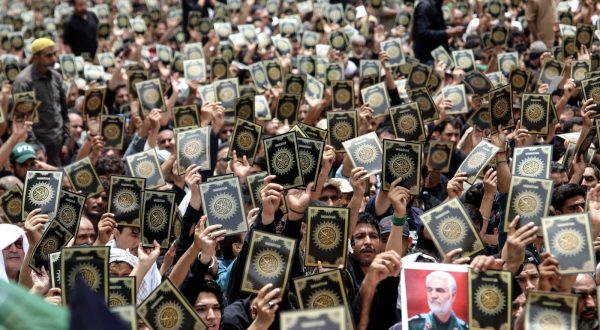 epa10775574 Pakistani Shiite Muslims hold up flyers depicting the Koran as a protest against its desecration in Sweden, on Ashura Day during the holy month of Muharram in Karachi, Pakistan, 29 July 2023. Shiite Muslims across the world are observing the holy month of Muharram, the first month of the Islamic calendar. The climax of Muharram is the Ashura Day that commemorates the martyrdom of Imam Hussein, a grandson of the Prophet Mohammed, who was killed in a battle of the Iraqi city of Karbala in the seventh century.  EPA/REHAN KHAN