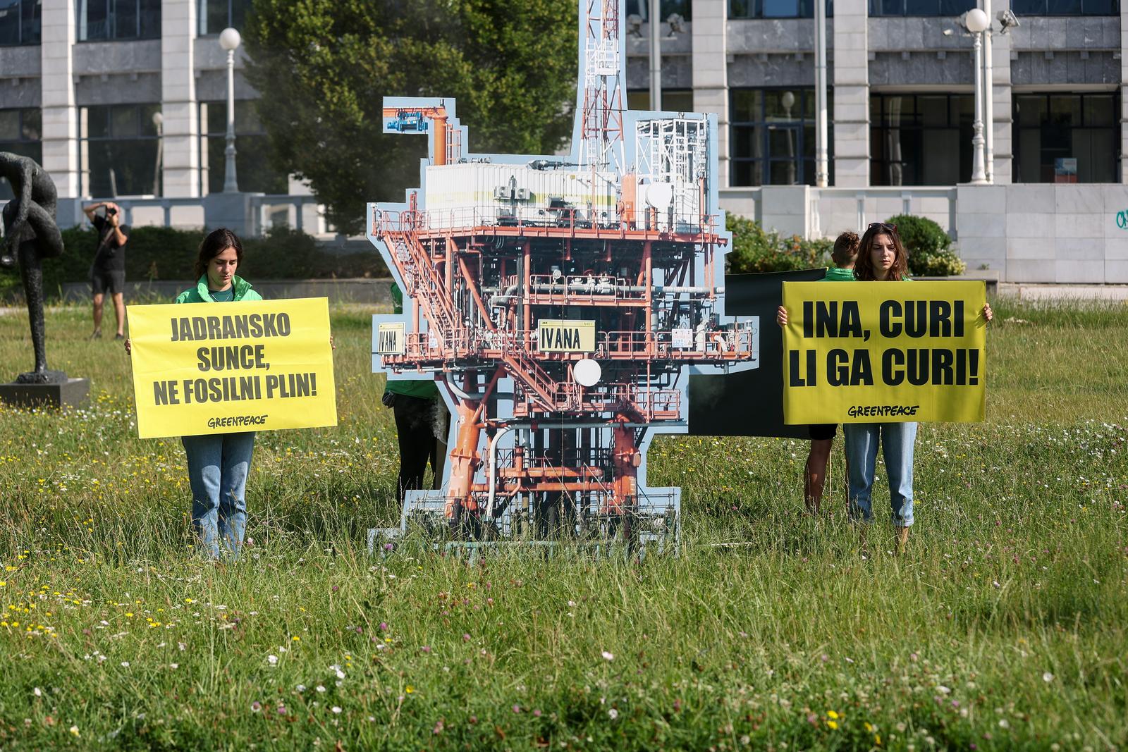 05.07.2023., Zagreb - Akcija aktivista Greenpeacea kojom su upozorili na curenje metana iz devet platformi na sjevernom Jadranu ispred zgrade INE. Photo: Igor Kralj/PIXSELL
