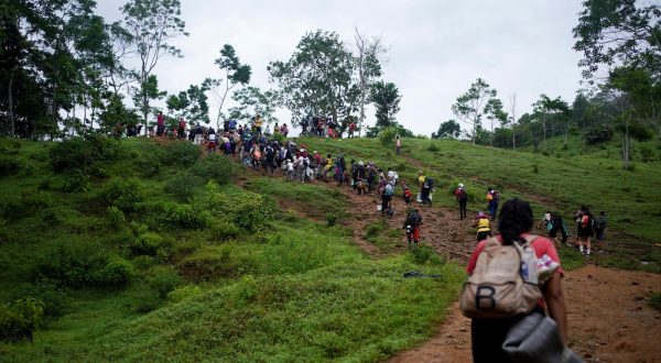 A group of migrants from different countries walk through the Darien Gap, as they continue their journey to the U.S. border, in Acandi, Colombia July 9, 2023. REUTERS/Adri Salido NO RESALES. NO ARCHIVES Photo: Stringer/REUTERS