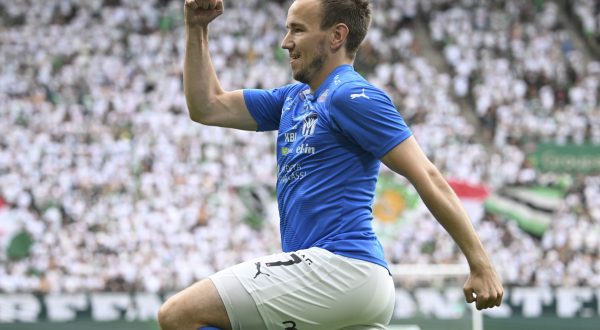 KI Klaksvik's Arni Frederiksberg celebrates after scoring his side's second goal during the soccer Champions League qualifying first round second leg match between Ferencvaros and KI Klaksvik of the Faroe Islands in Groupama Arena in Budapest, Hungary, Wednesday, July 19, 2023. (Tibor Illyes/MTI via AP)