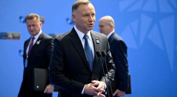 epa10739040 Poland's President Andrzej Duda speaks to the media as he arrives to attend the NATO summit in Vilnius, Lithuania, 11 July 2023. The North Atlantic Treaty Organization (NATO) Summit will take place in Vilnius on 11 and 12 July 2023 with the alliance's leaders expected to adopt new defense plans.  EPA/FILIP SINGER