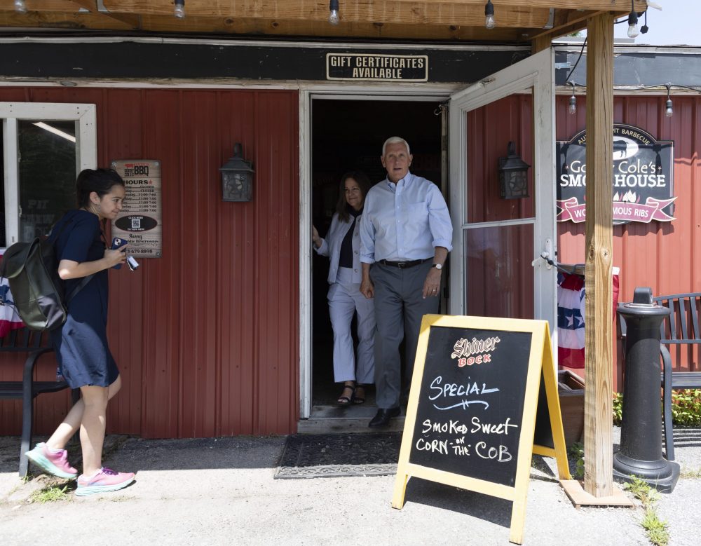 epa10758560 Republican candidate for President, former Vice President Mike Pence (R) and his wife Karen (L) exit Goody Coles BBQ after having lunch with supporters during a campaign stop in Brentwood, New Hampshire, USA, 20 July 2023. Pence is on a three-day campaign trip to the Republican first primary state of New Hampshire.  EPA/CJ GUNTHER