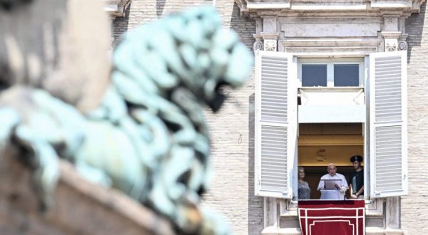 epa10763667 Pope Francis leads his Sunday Angelus prayer from a window overlooking the Saint Peter's Square, in Vatican City, 23 July 2023.  EPA/CLAUDIO PERI