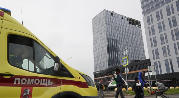 epa10765760 A damaged building (C) following a drone attack in Moscow, Russia, 24 July 2023. The Russian Ministry of Defense on 24 July accused Ukraine of carrying out an attack with two unmanned aerial vehicles (UAV) against facilities in Moscow, adding that the attack was foiled and the two UAVs 'were suppressed by means of electronic warfare and crashed' leaving no casualties.  EPA/MAXIM SHIPENKOV