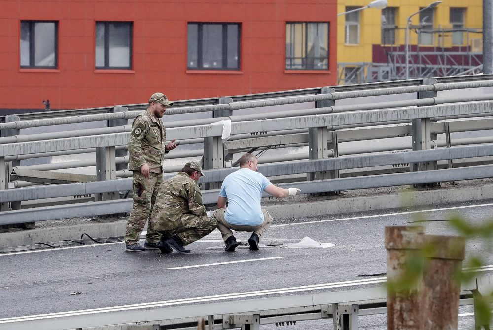 epa10765742 Russian Special Services work outside a damaged building following a drone attack in Moscow, Russia, 24 July 2023. The Russian Ministry of Defense on 24 July accused Ukraine of carrying out an attack with two unmanned aerial vehicles (UAV) against facilities in Moscow, adding that the attack was foiled and the two UAVs 'were suppressed by means of electronic warfare and crashed' leaving no casualties.  EPA/MAXIM SHIPENKOV