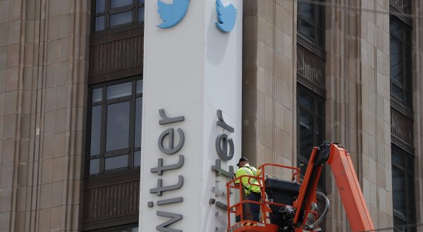 epa10766831 Workers remove letters from the iconic vertical Twitter sign at the companyâ€™s headquarters after Twitter owner Elon Musk annouced the rebranding of the social media platorm to X in San Francisco, California, USA, 24 July 2023. Work was halted due to San Francisco police responding to a call from building security that the signs were being stolen. A San Francisco police spokesperson stated that Twitter had a work order to take the sign down but didnâ€™t communicate that to security and the property owner of the building.  EPA/JOHN G. MABANGLO