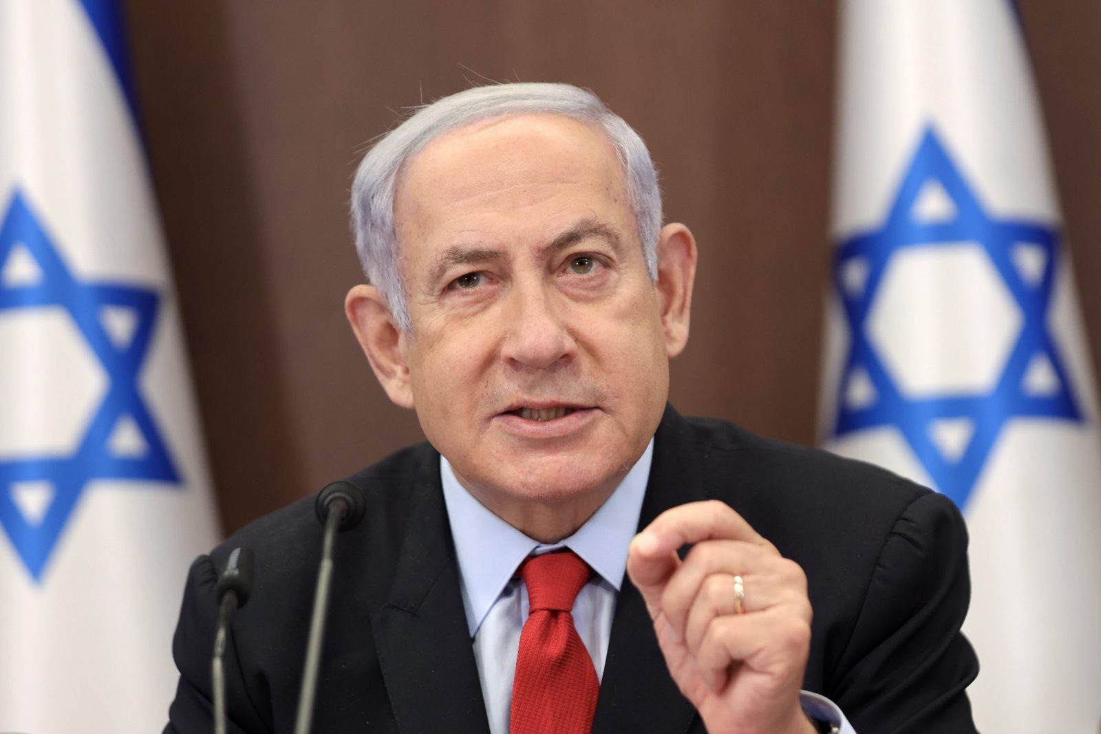 epa10776662 Israeli Prime Minister Benjamin Netanyahu speaks during the weekly cabinet meeting at the prime minister's office in Jerusalem, 30 July 2023.  EPA/ABIR SULTAN / POOL