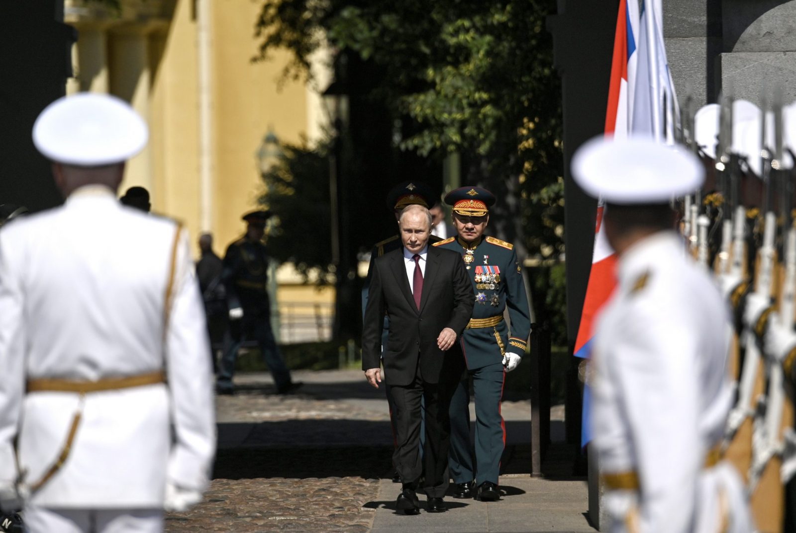 epa10776824 Russian President Vladimir Putin (C-L) and Russian Defence Minister Sergei Shoigu (C-R) arrive to attend the Navy Day parade, in St. Petersburg, Russia, 30 July 2023. President Putin announced that the Russian navy will get 30 new ships this year, during his speech at the annual Navy Day Parade in St Petersburg. Russian Navy Day is celebrated annually on the last Sunday of July.  EPA/ALEXEY DANICHEV / SPUTNIK / KREMLIN POOL / POOL -- MANDATORY CREDIT--