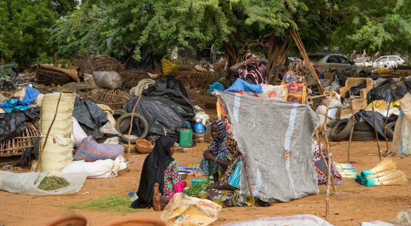 epa10780349 A group of women sell their produce at a market in Niamey, Niger, 01 August 2023. General Tchiani declared himself the new leader of Niger following a coup against democratically elected President Mohamed Bazoum on 26 July.  EPA/ISSIFOU DJIBO
