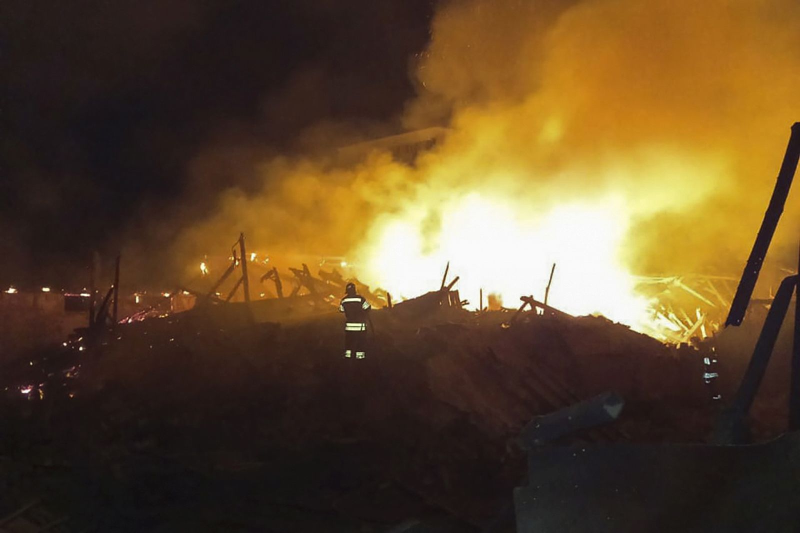 epa10787311 A handout picture made available by the Khmelnytskyi Regional Military Administration shows Ukrainian rescuers putting out a fire at a corn waste warehouse after shelling near Starokostiantyniv, Khmelnytskyi region, western Ukraine, 06 August 2023, amid the Russian invasion. Ukraine was attacked by more than 70 missiles and shock drones in the night between 05 August and 06 August, with 30 rockets of different classes and 27 shock drones being shot down, according to a statement by the Ukrainian Air Force. Russian troops entered Ukrainian territory in February 2022, starting a conflict that has provoked destruction and a humanitarian crisis.  EPA/KHMELNYTSKYI REGIONAL MILITARY ADMINISTRATION HANDOUT -- MANDATORY CREDIT: KHMELNYTSKYI REGIONAL MILITARY ADMINISTRATION -- BEST QUALITY AVAILABLE -- HANDOUT EDITORIAL USE ONLY/NO SALES