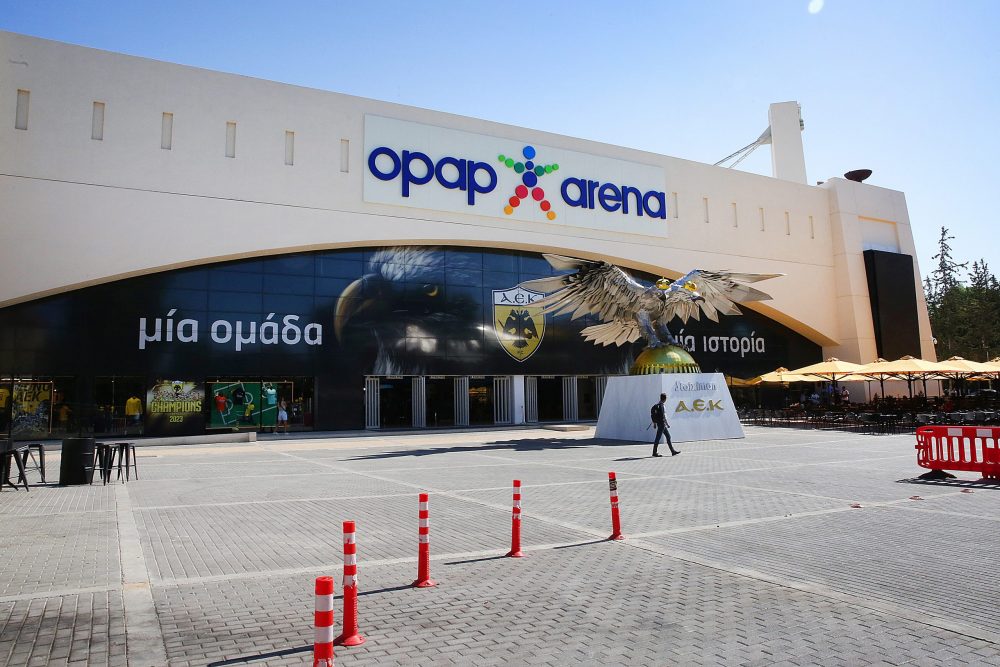 epa10790366 A man walks outside the AEK football club stadium in Nea Philadelphia where on the night of 07 August, a 29-year-old man was knifed to death during clashes between football supporters, in Athens, Greece, 08 August 2023. He was one of nine people in total who were injured during violent incidents between AEK and Dinamo Zagreb supporters. Strong police forces were sent to stop the violence, detained 98 people involved in the incidents, while an inquiry to locate additional culprits and shed light on any other aspect of the case is continuing.  EPA/ORESTIS PANAGIOTOU